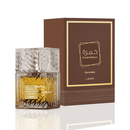Lattafa Khamrah Qahwa perfume bottle with packaging box, featuring amber liquid in a crystal-cut glass design on a warm background.